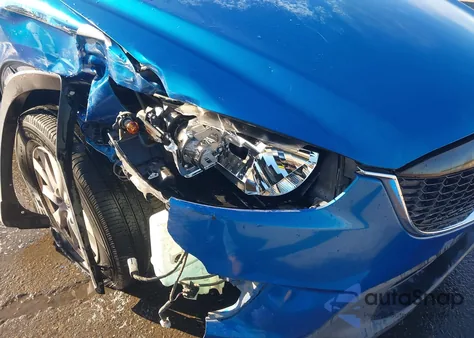 2013 Mazda Cx-5 Touring z USA, uszkodzony, nr VIN JM3KE2CE7D0165697